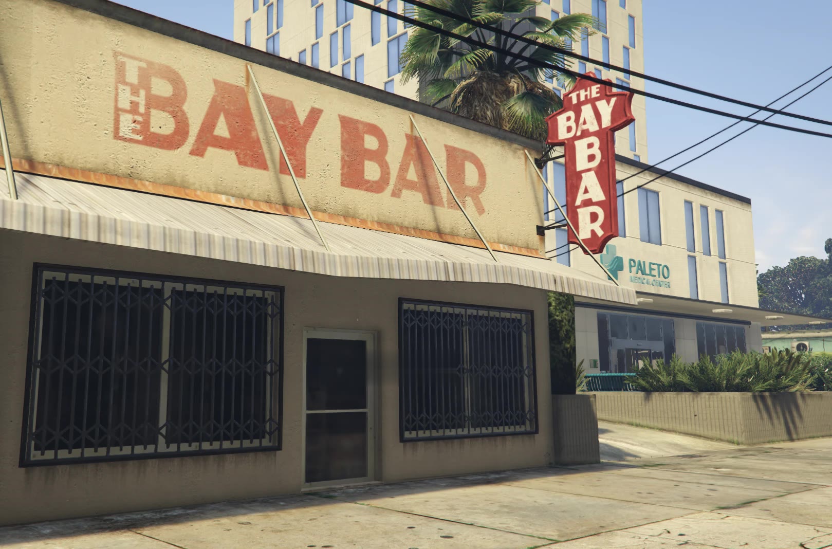 The Bay Bar building on Paleto Boulevard, now home to The Dispatch Bar and Diner, with Paleto Medical Center next door